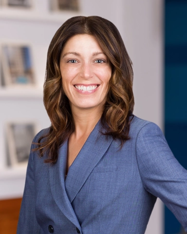 smiling person in professional attire